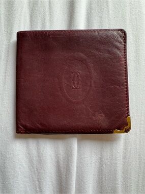 Authentic vintage Cartier  Burgundy Leather Bifold Wallet with Gold Corner